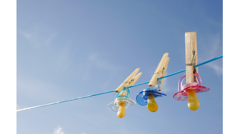 Pacifiers in clothes line