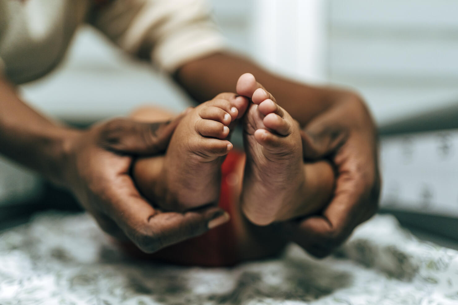 Tiny foot of newborn baby