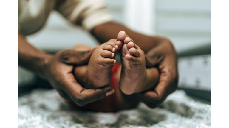Tiny foot of newborn baby