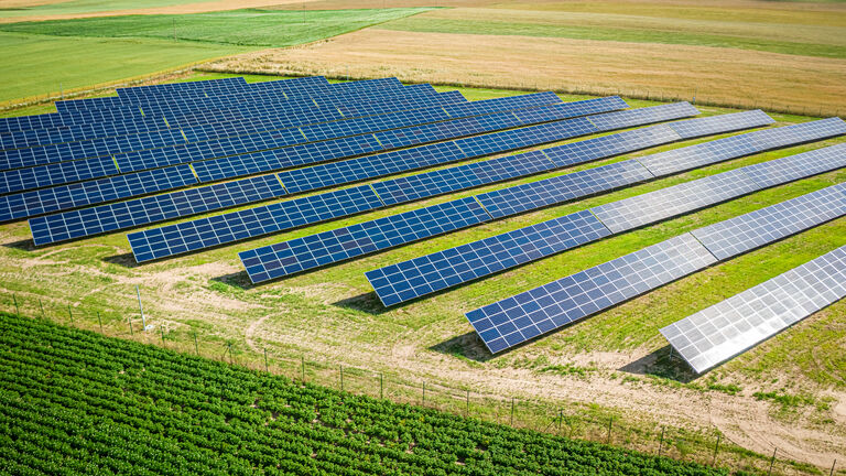 Solar panels on field in summer, aerial view of Poland