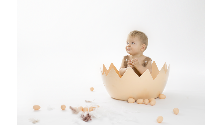 Human Baby In A Cracked Eggshell