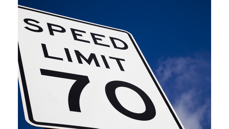 speed limit 70 highway sign blue sky copy space