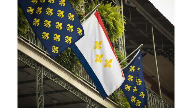 Flag of New Orleans flies in the French Quarter Louisiana USA