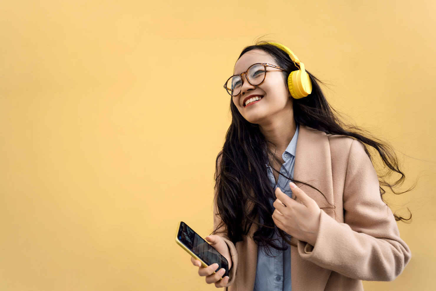 Young asian woman with headphones