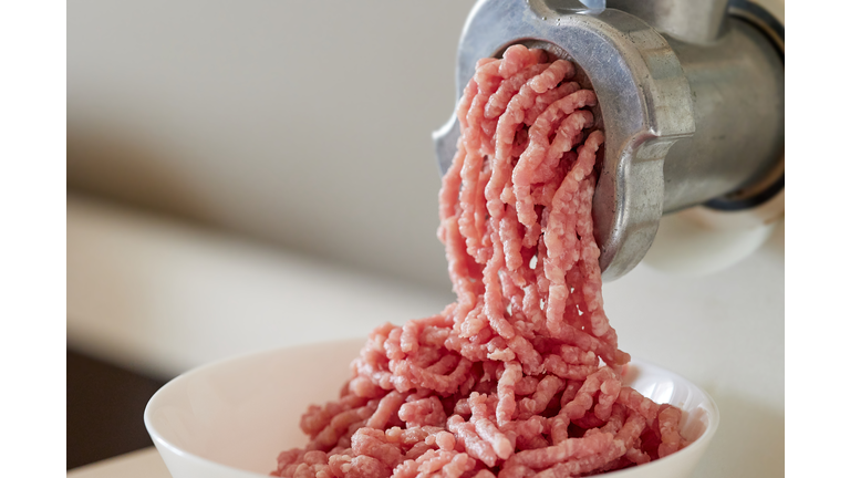 mince the meat with an electric meat mincer