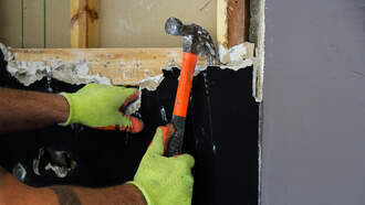 Watch: They Found A Secret Stash Inside A Wall During A Kitchen Renovation