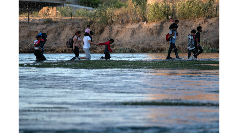 MEXICO-US-BORDER-MIGRATION-RIVER-WALL