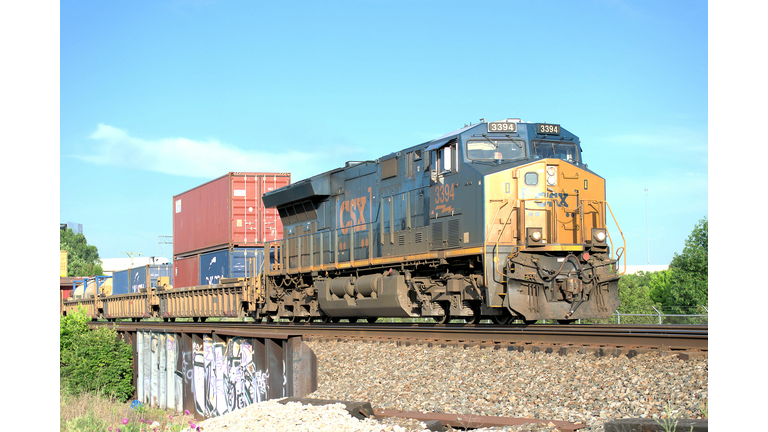 Dayton, Ohio, USA -June 6, 2020: A CSX freight train hauling cargo through southern Ohio.