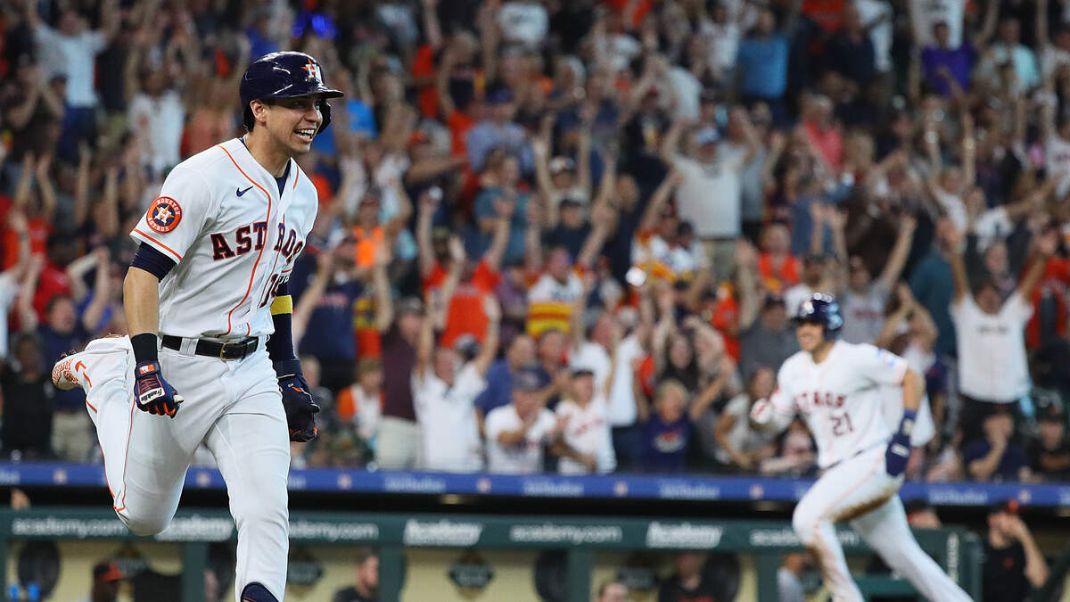 Houston Astros shortstop Mauricio Dubon (14) hits an RBI single to left  field in the bottom of the fifth inning of the MLB game between the Houston  As Stock Photo - Alamy