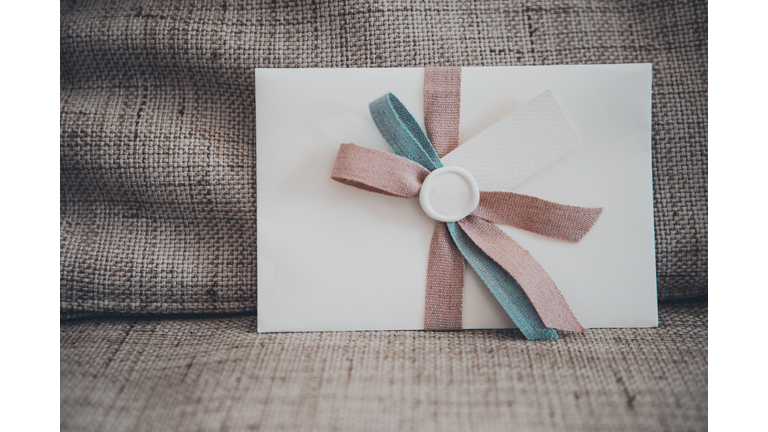 Close up of a wedding invitation on a wedding set, Lombardy, Italy