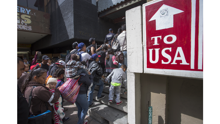 Migrants In Caravan That Travelled Through Mexico Attempt To Be Granted Asylum At U.S. Border