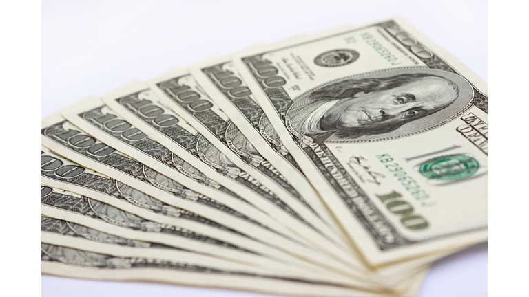 Bundle of dollars on the table close-up - texture, background