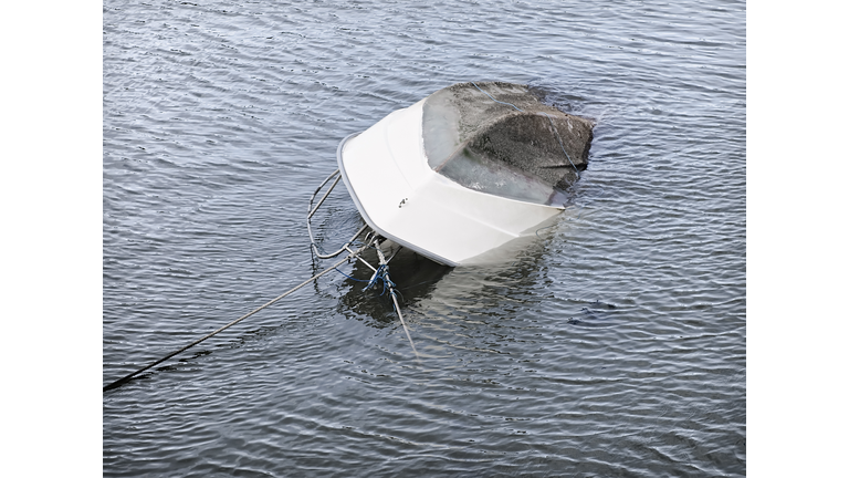 Capsized Boat Sinking