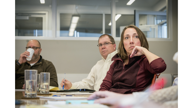 Business people listening in office meeting