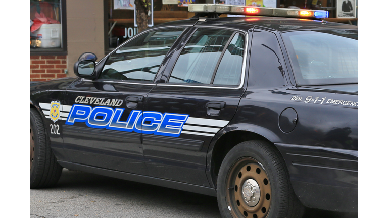 Close-up of a Cleveland police vehicle with flashing lights