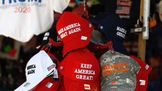 It Is Real! Joe Biden Puts On A MAGA Hat!