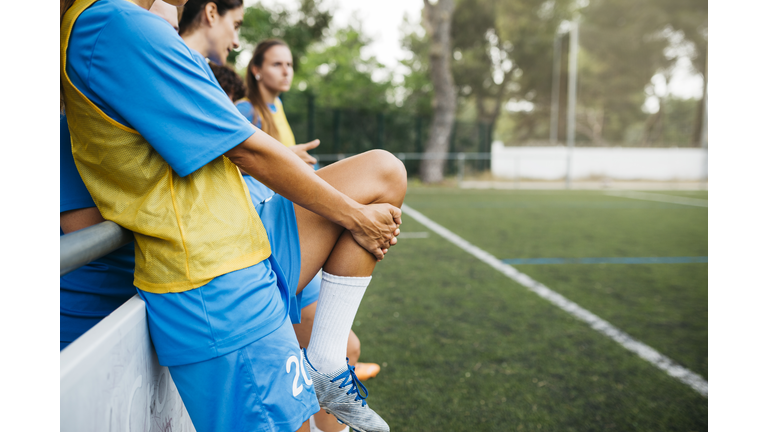 Female soccer team warming up