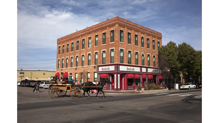 Horse drawn carriage and shops Pueblo Colorado