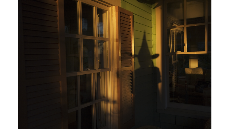 Shadow of witch on house, at Halloween, Norfolk, Virginia, USA