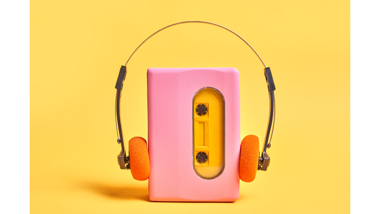 Pink Portable Audio Cassette Player On Yellow