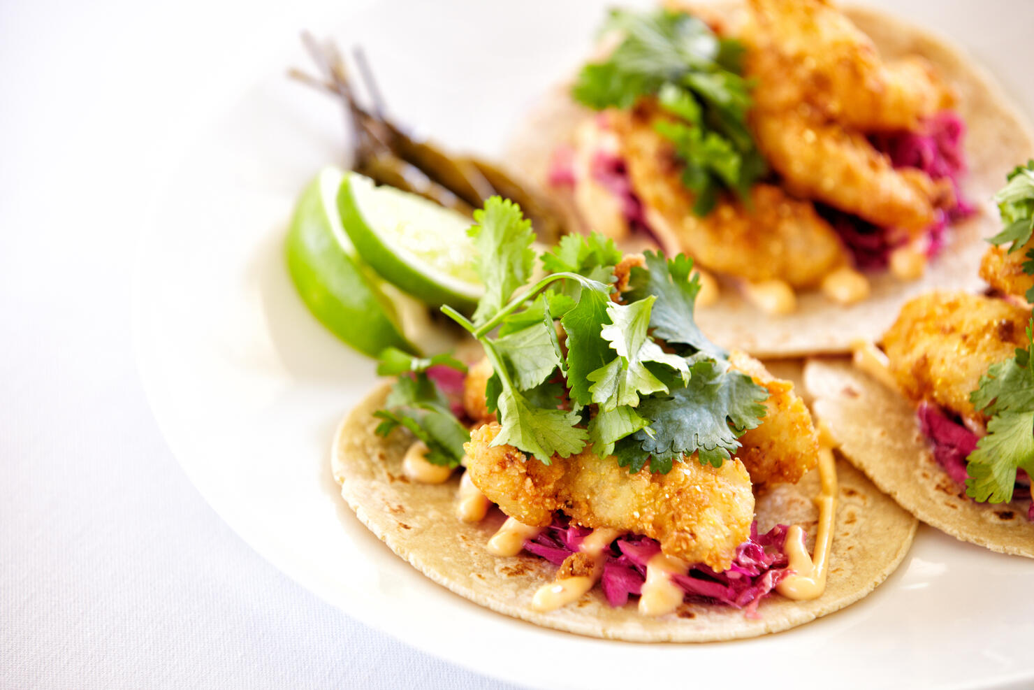 Close up of fish tacos on a plate