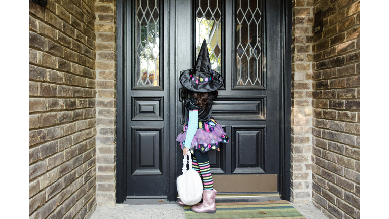 Young girl dressed up for Halloween.