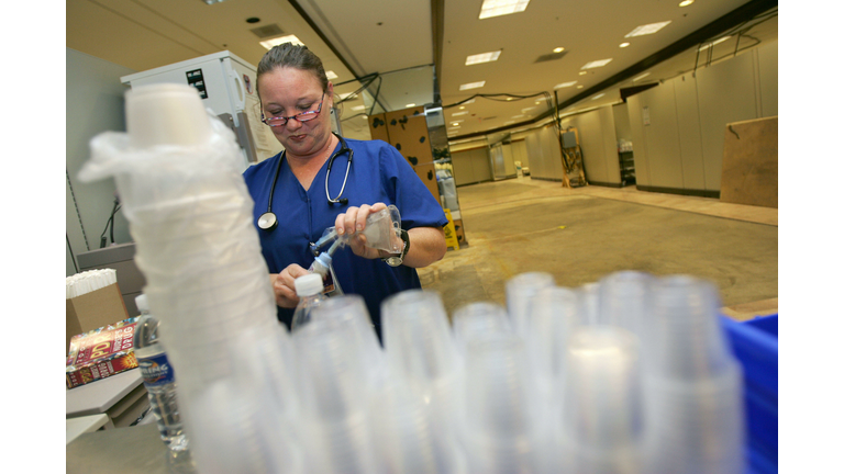 Nurse Sheri Pellagalle prepares intavene