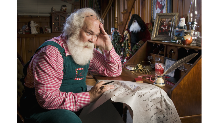 Santa Claus checking his list