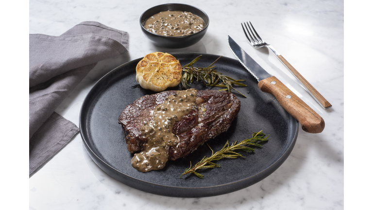Grilled Beef Steak with Black Pepper Sauce