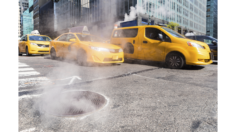 USA, New York, steam coming out from sewer