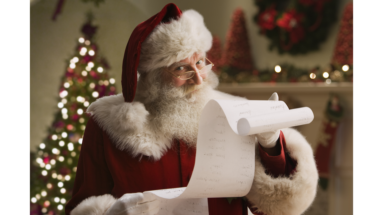 Santa Claus with checklist, portrait, close-up