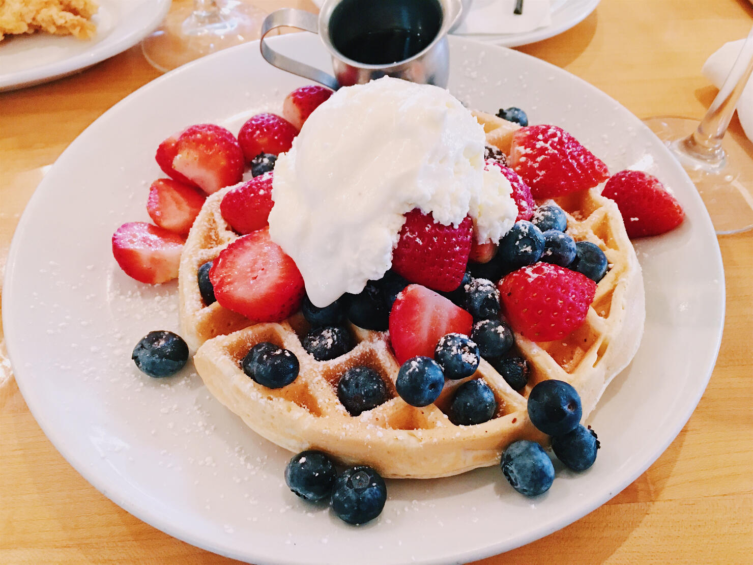 Waffle with blueberry, strawberry and ice cream