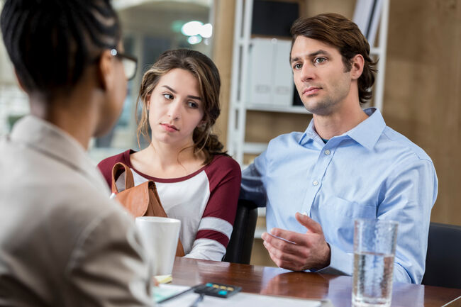 Serious parent teacher discussion