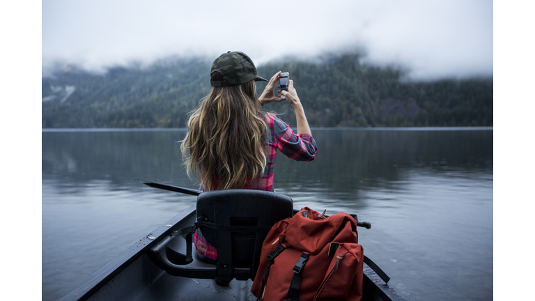 A woman in a canoe.