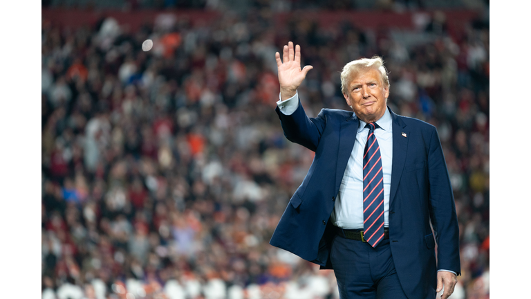 Donald Trump Attends The Palmetto Bowl In South Carolina As He Campaigns For President