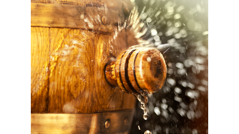 Wine Spilling from a Barrel
