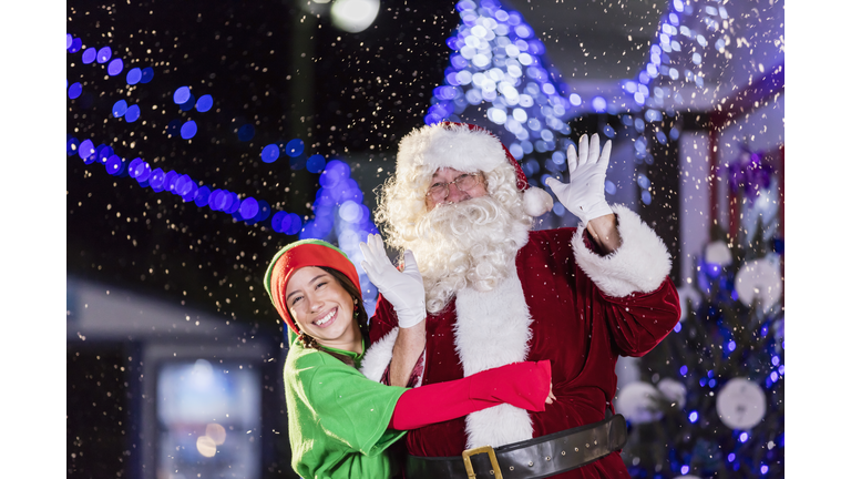 Santa and elf at winter festival