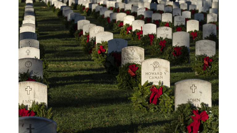 Volunteers Place Holiday Wreaths On Arlington National Cemetery Headstones