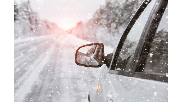 The winter road with car