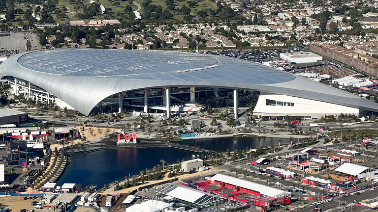 Crews engage in final preparations for Super Bowl LVI at SoFi Stadium.