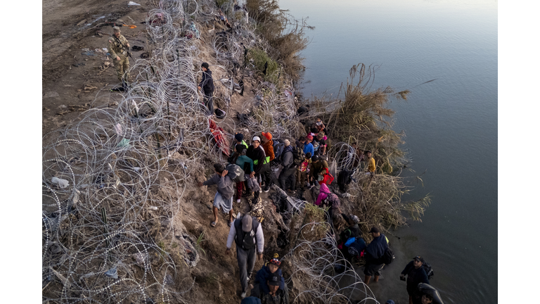 Surge Of Migrants Overwhelms Border Crossings