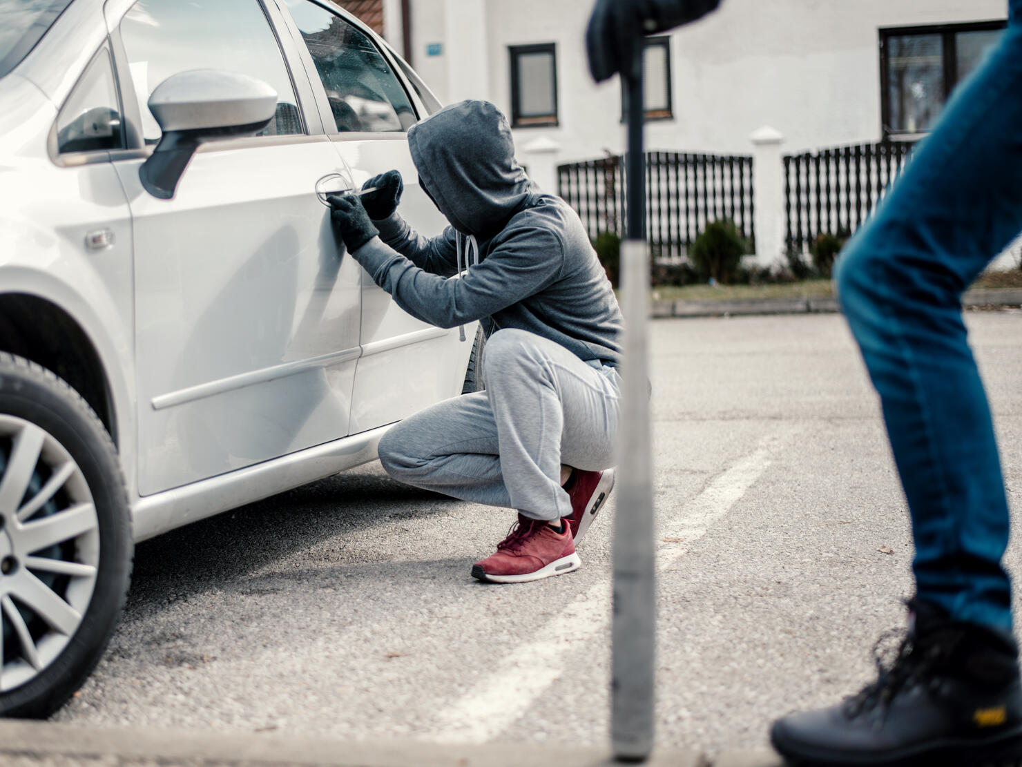 Men stealing a car