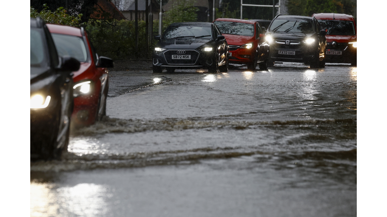 The South Of England Basks In Unseasonably Warm Weather As Torrential Rain Sweeps Scotland