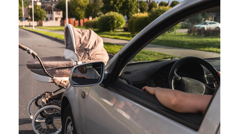 Vehicle hits the baby pram on the road because of jaywalking