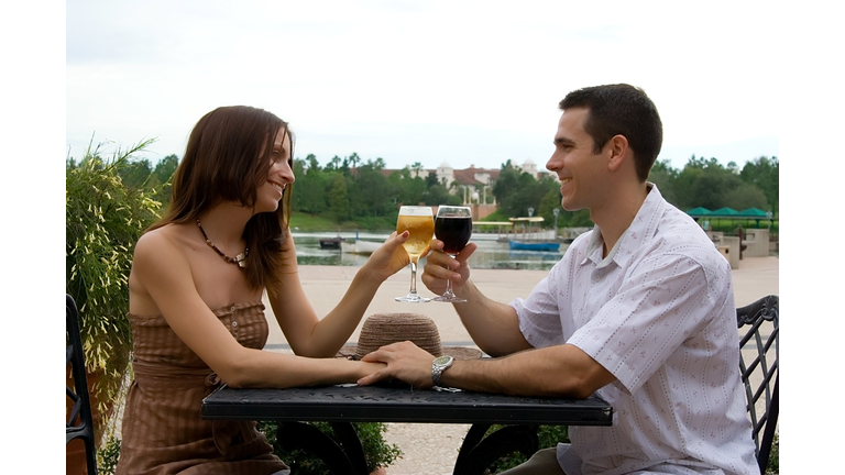 Happy couple drinking wine