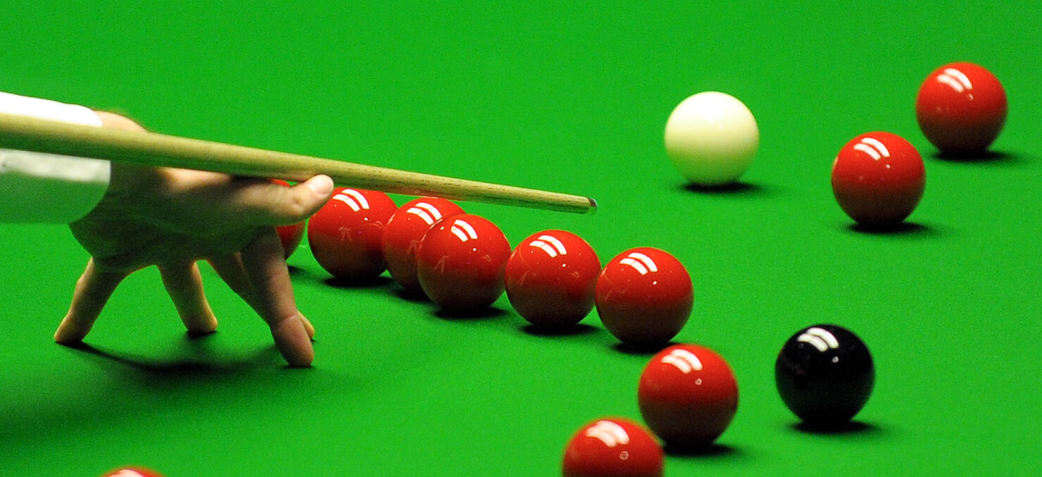 Ali Carter of Great Britain plays a shot
