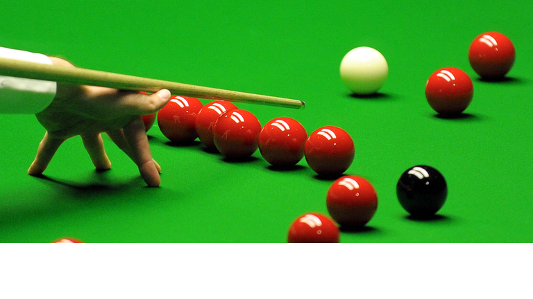 Ali Carter of Great Britain plays a shot