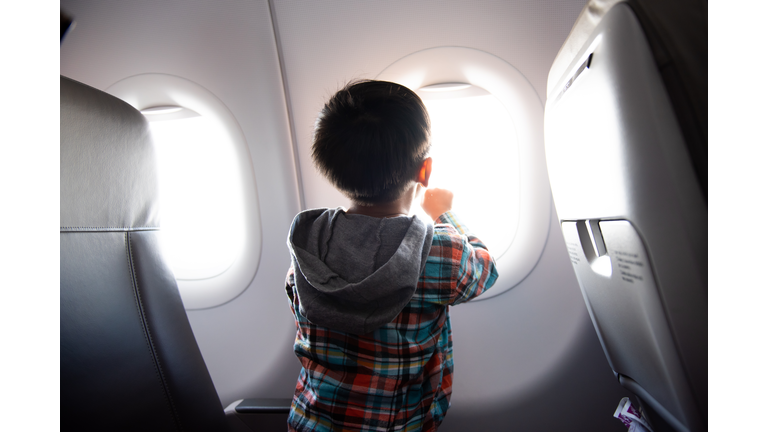 Child traveling on a plane
