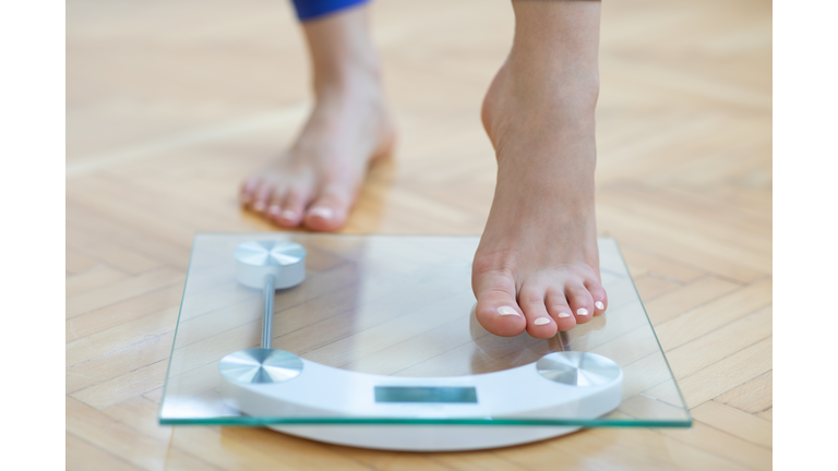 Female feet weighing scale