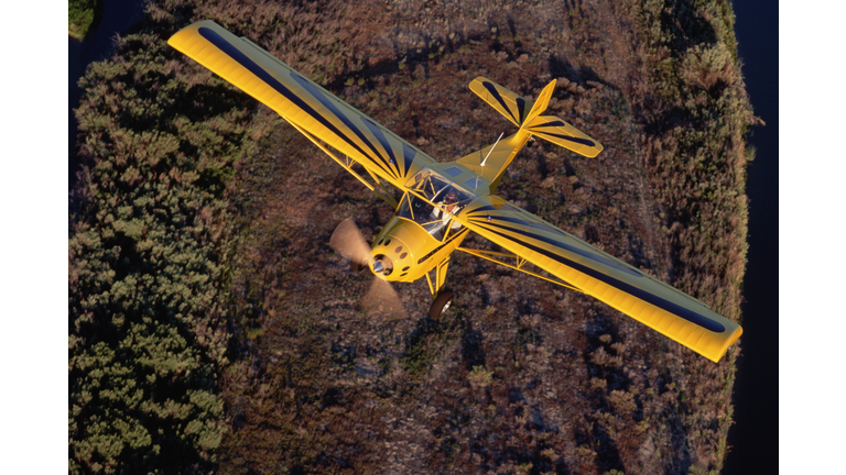 Yellow Kitfox Airplane Flying